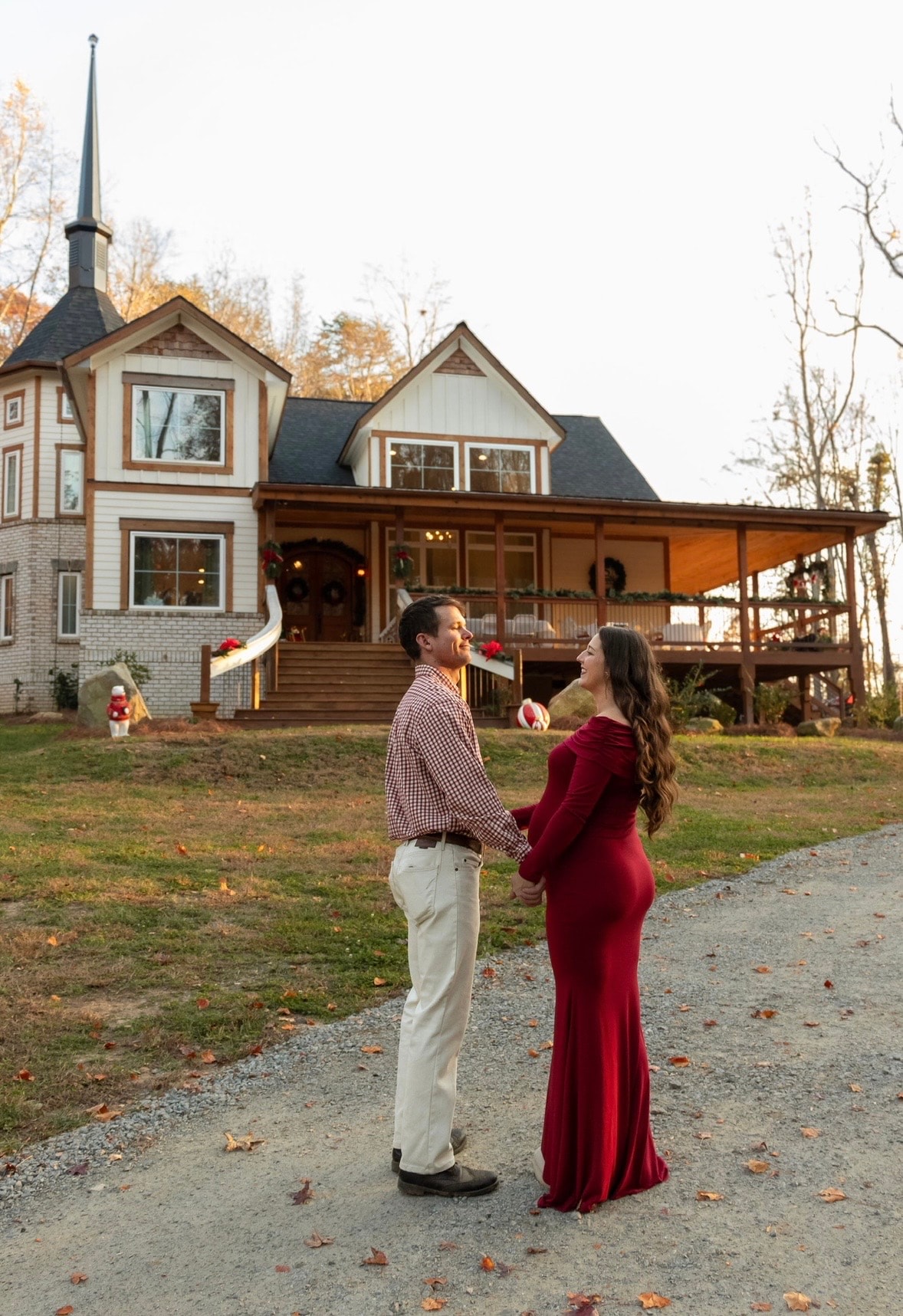 Owners in front of the completed investment property